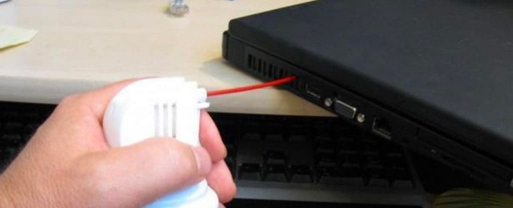 Compressed air hack to clean laptop vents