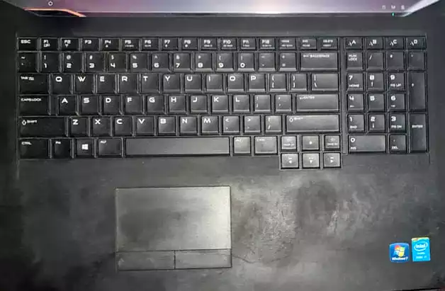 How to clean rubberized laptop surfaces