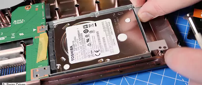 How to remove a hard drive from a Toshiba laptop
